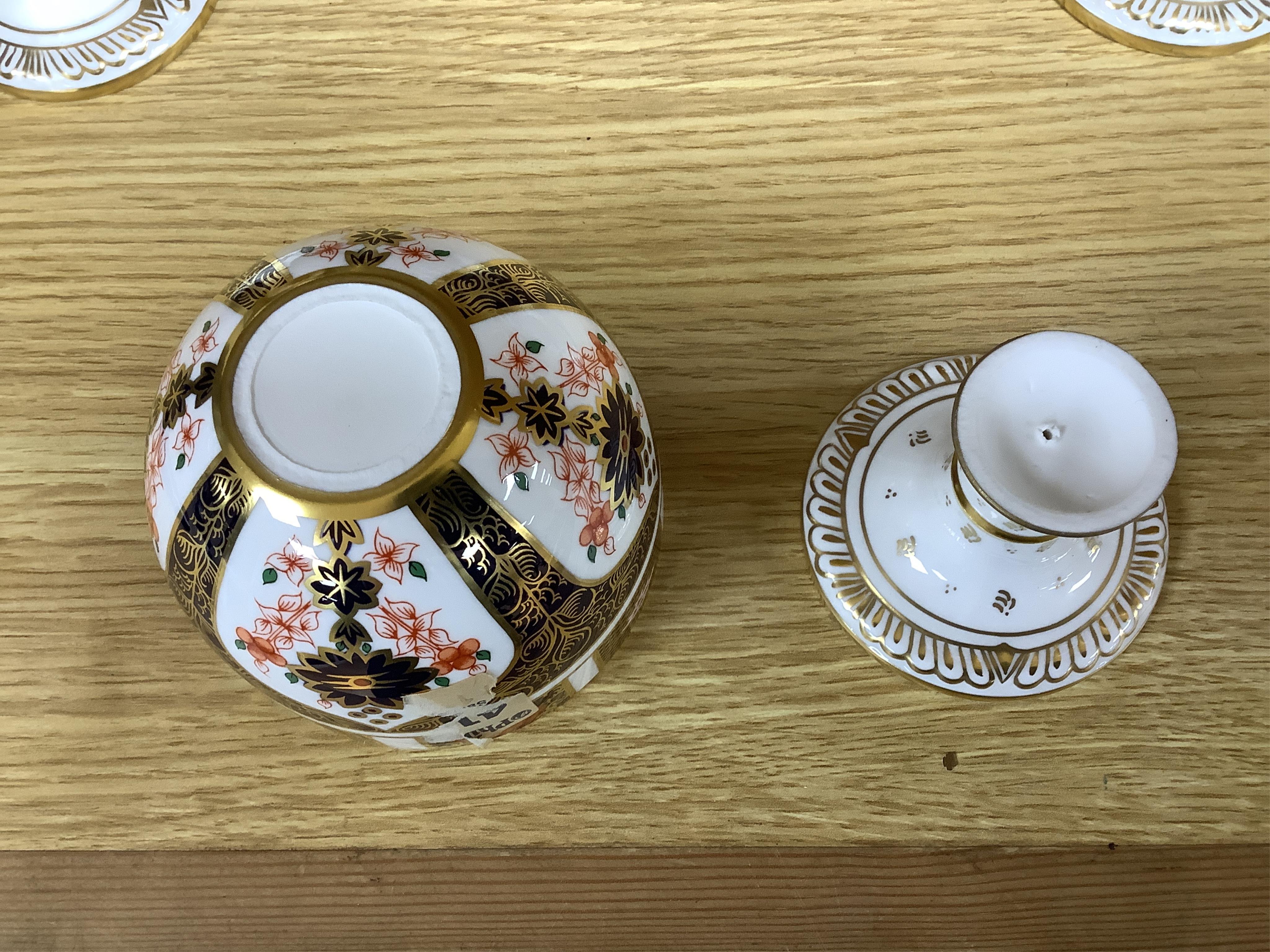 A group of six Royal Crown Derby stemmed cups (one cup and stem detached). 12.5cm high